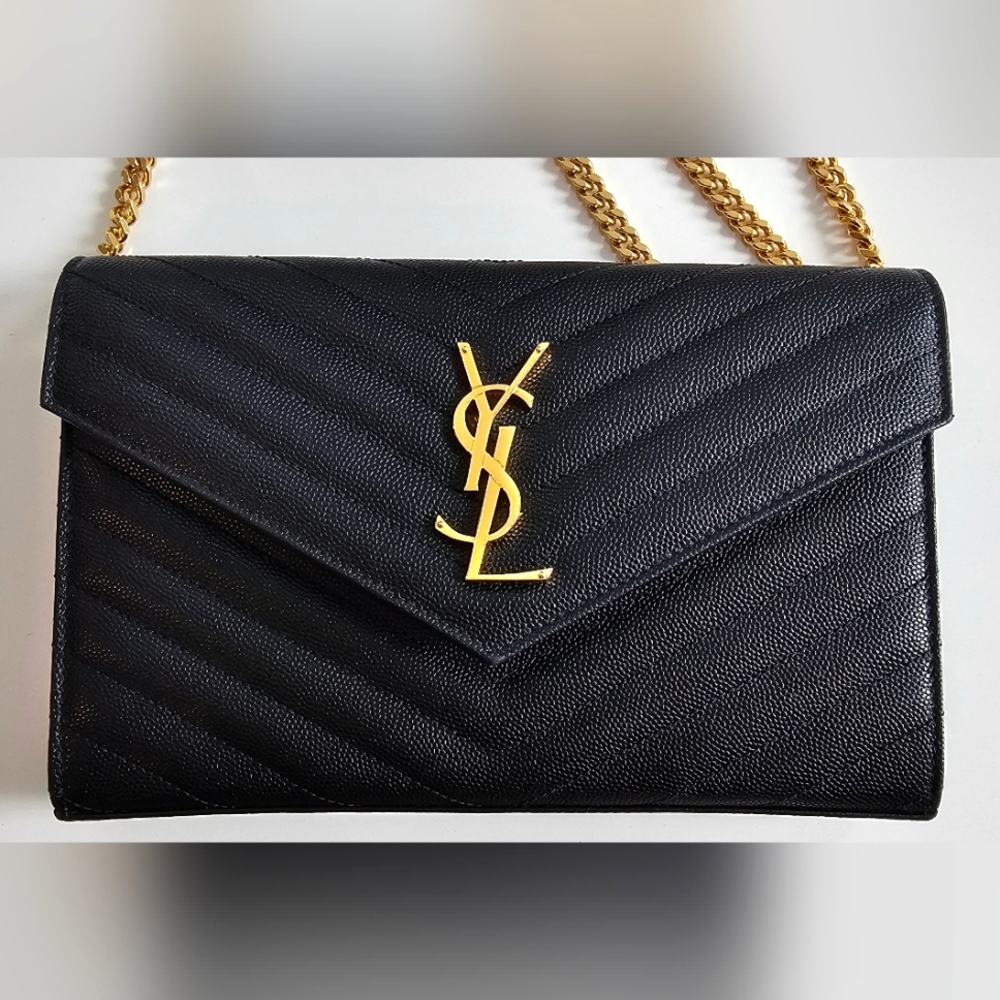 Yves Saint Laurent Black and Gold Quilted Clutch